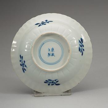 A set of six blue and white small lotus dishes, Qing dynasty with Kangxis four character mark (1662-1722).