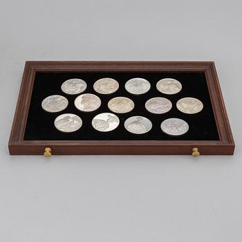 A set of 50 Sterling silver medals from Franklin Mint.
