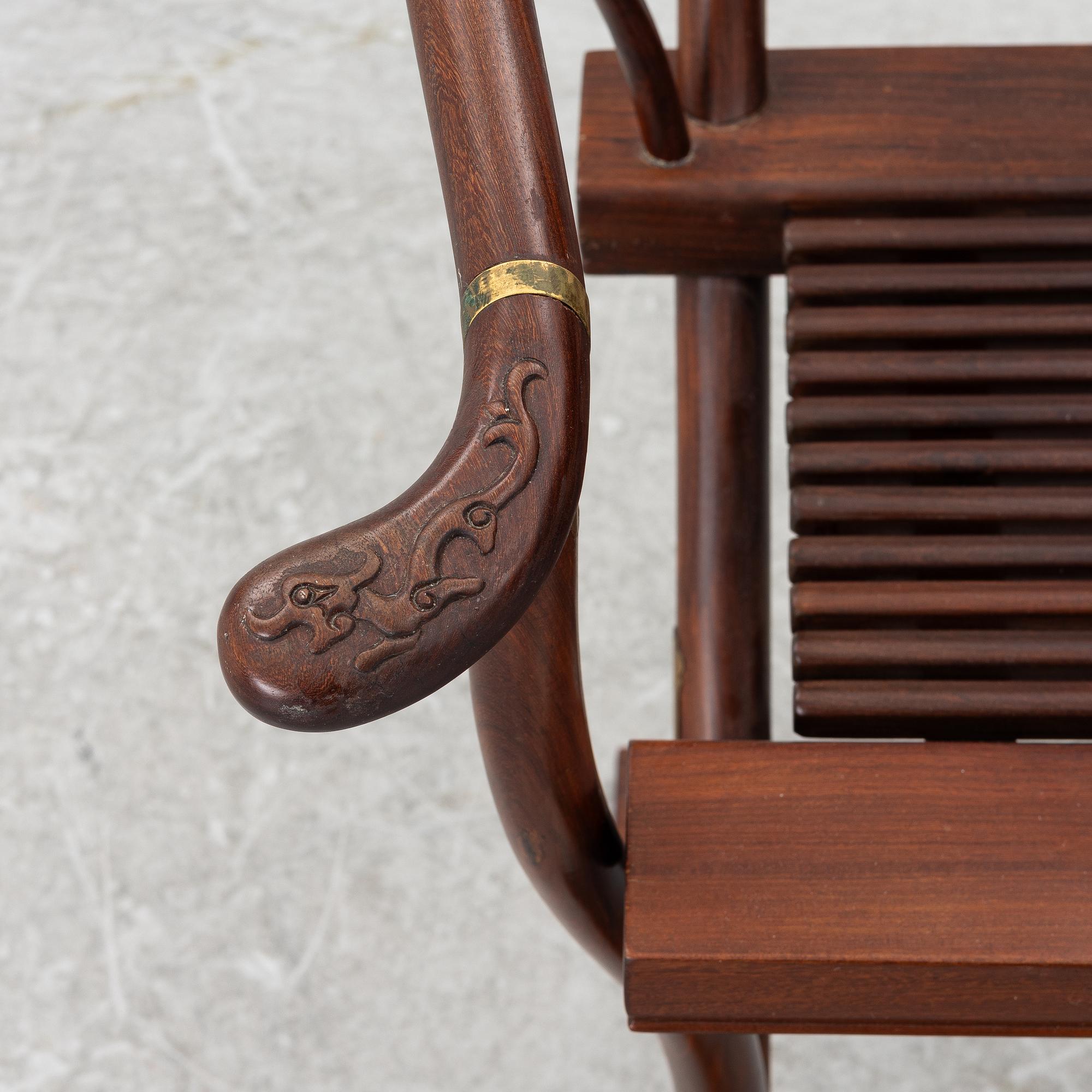 A Chinese hardwood folding chair, 20th century.