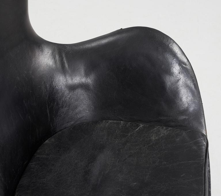 An Arne Jacobsen black leather 'Egg' chair, Fritz Hansen, Denmark 1960's.