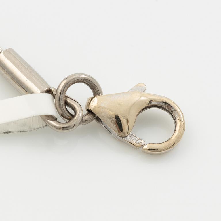 Collier 18K vitguld med dropp-, baguette och briljantslipade diamanter.