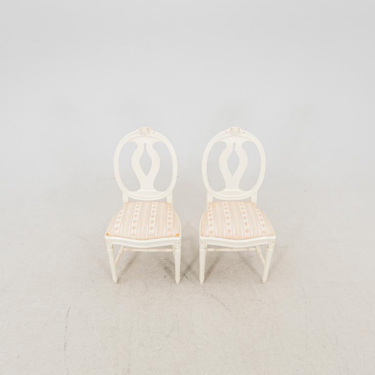 A late 20th century painted Gustavian style 5 pcs dining suit.