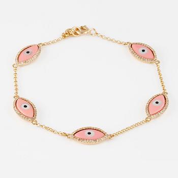 ARMBAND, 18K guld med briljantslipade diamanter ca 0.30 ct, pärlemor samt emalj. Vikt 3,5 gram.