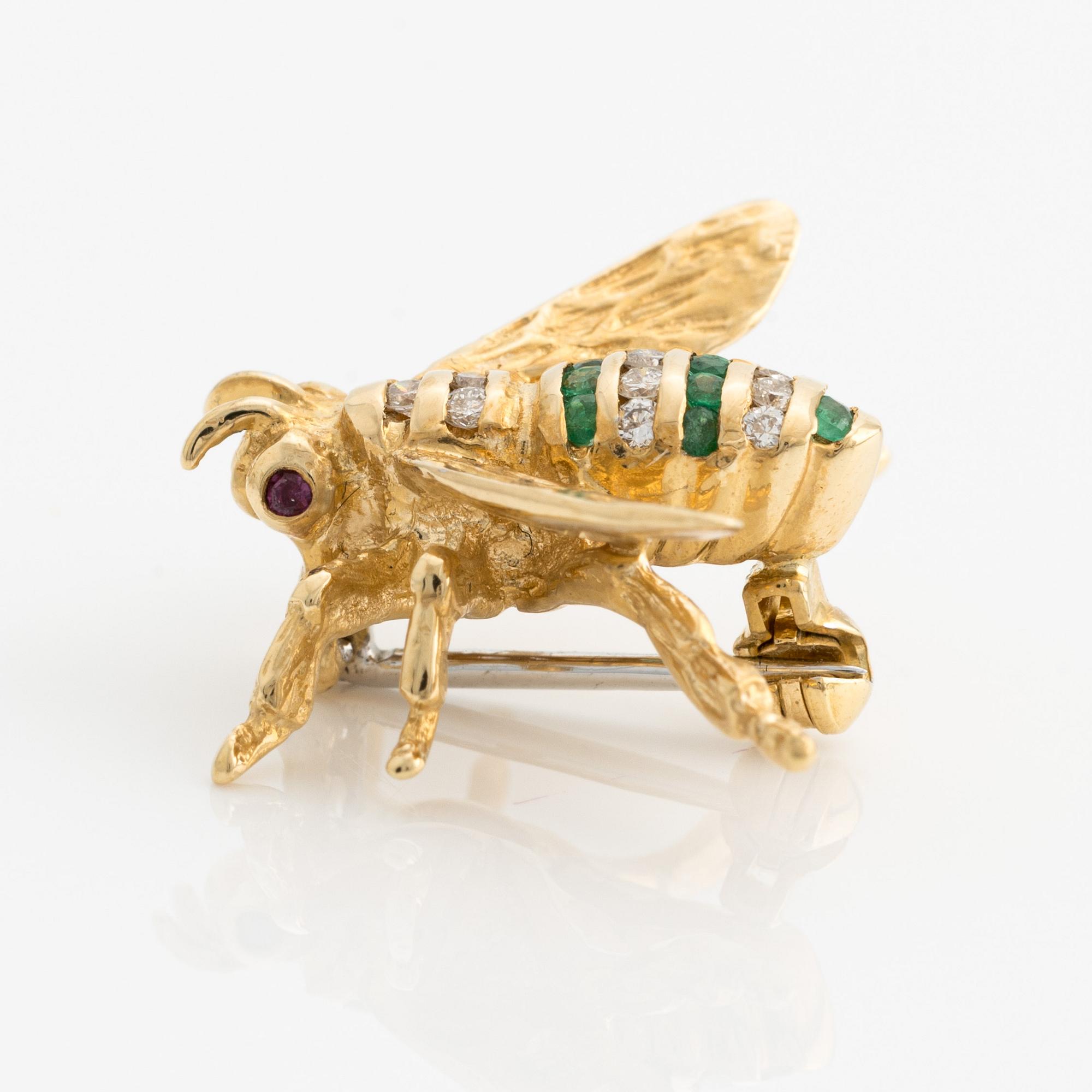 Brooch, in the shape of an insect, gold with emeralds and brilliant-cut diamonds.