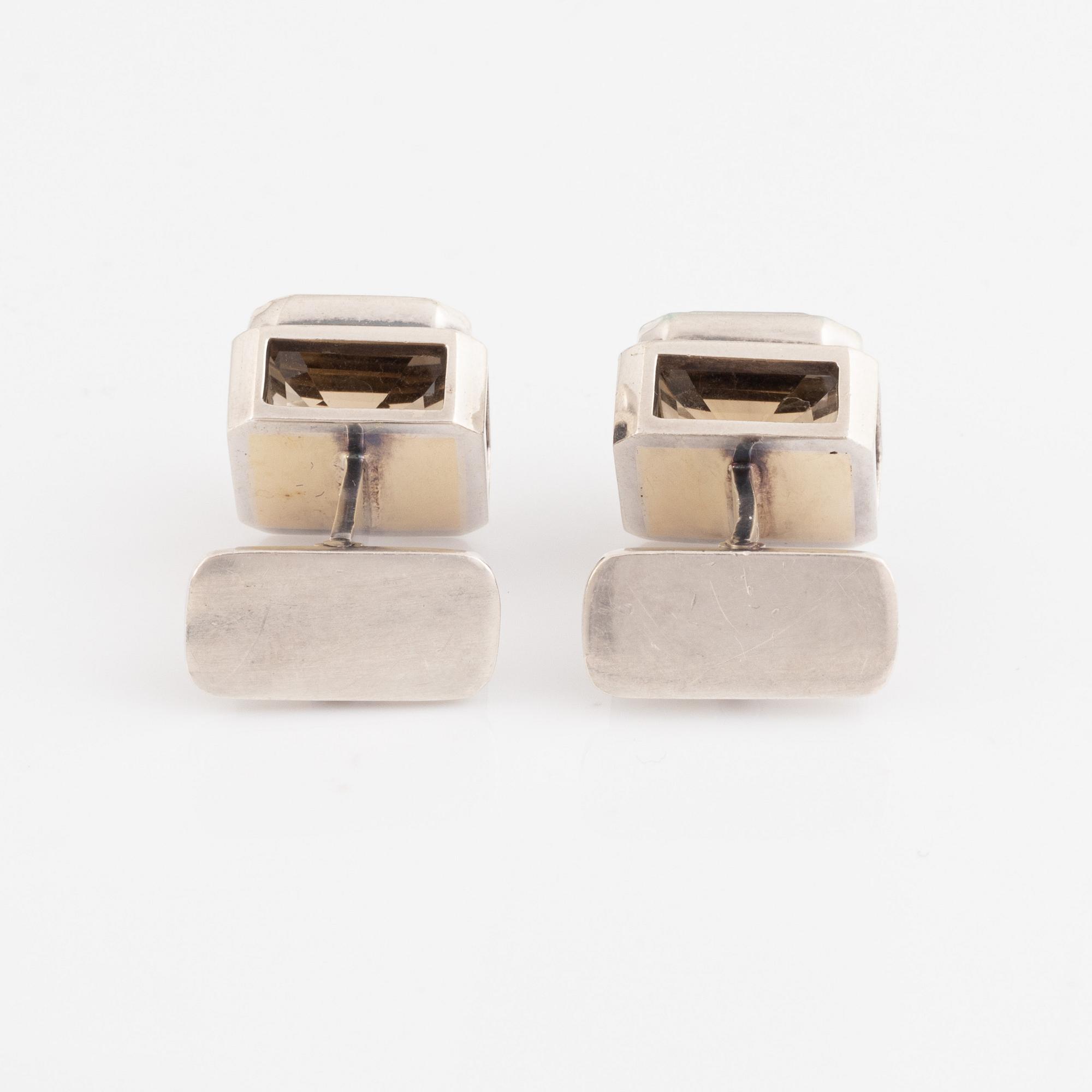 Karl-Ingemar Johansson, cuff links, silver with smoky quartz.