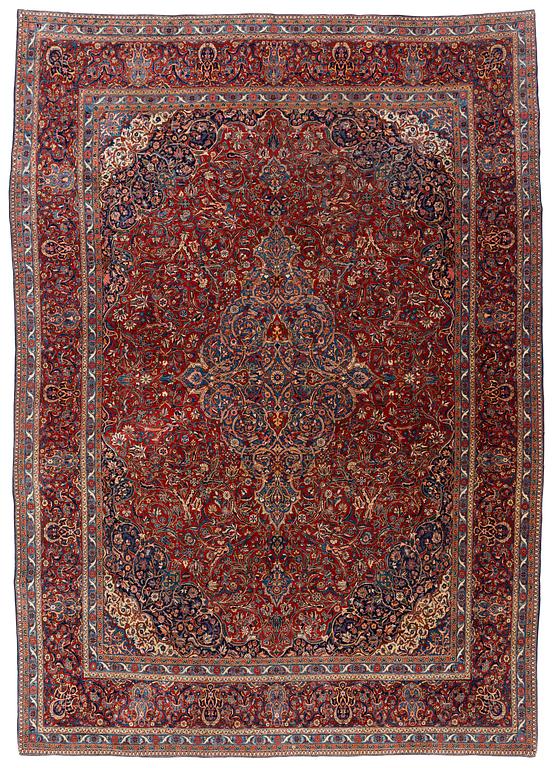 A semi-antique Kashan carpet, ca 437 x 304-310 cm.
