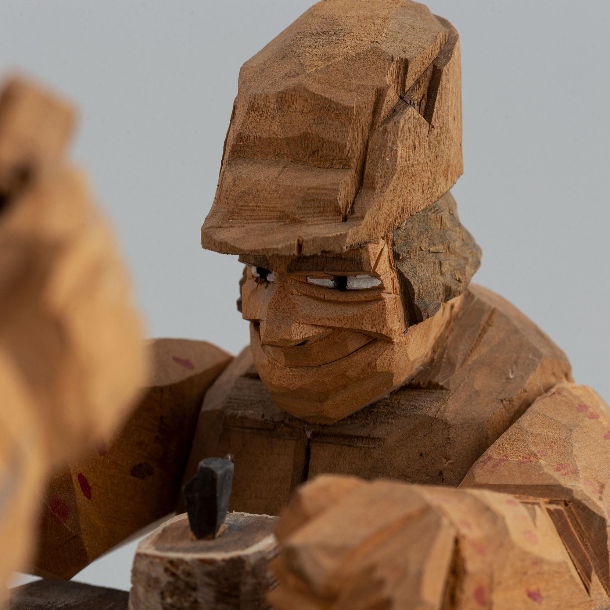 Oidentifierad konstnär, träskulptur, signerad och daterad 1920.