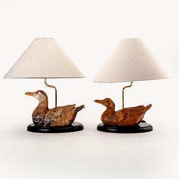 A similar pair of wood and brass table lamps from the later part of the 20th century.