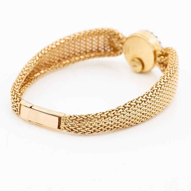 Piaget, armbandsur 18K guld och runda briljantslipade diamanter med länk av W.A. Bolin.