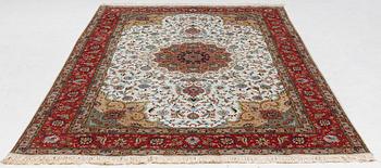 Rug, Tabriz, approx. 312 x 200 cm.