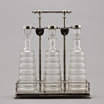 TANTALUS, nysilver samt glas, sekelskiftet 1900.