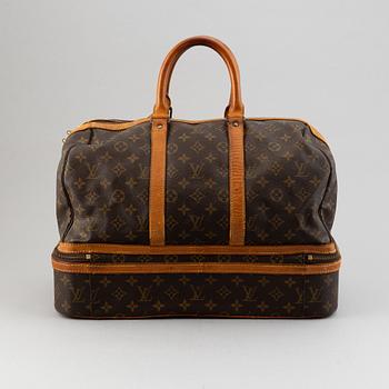 Louis Vuitton, a monogram canvas weekend bag.