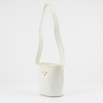 Prada, a white saffiano leather bag.