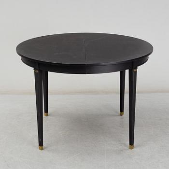 A Gustavian style painted dining table, second half of the 20th century.