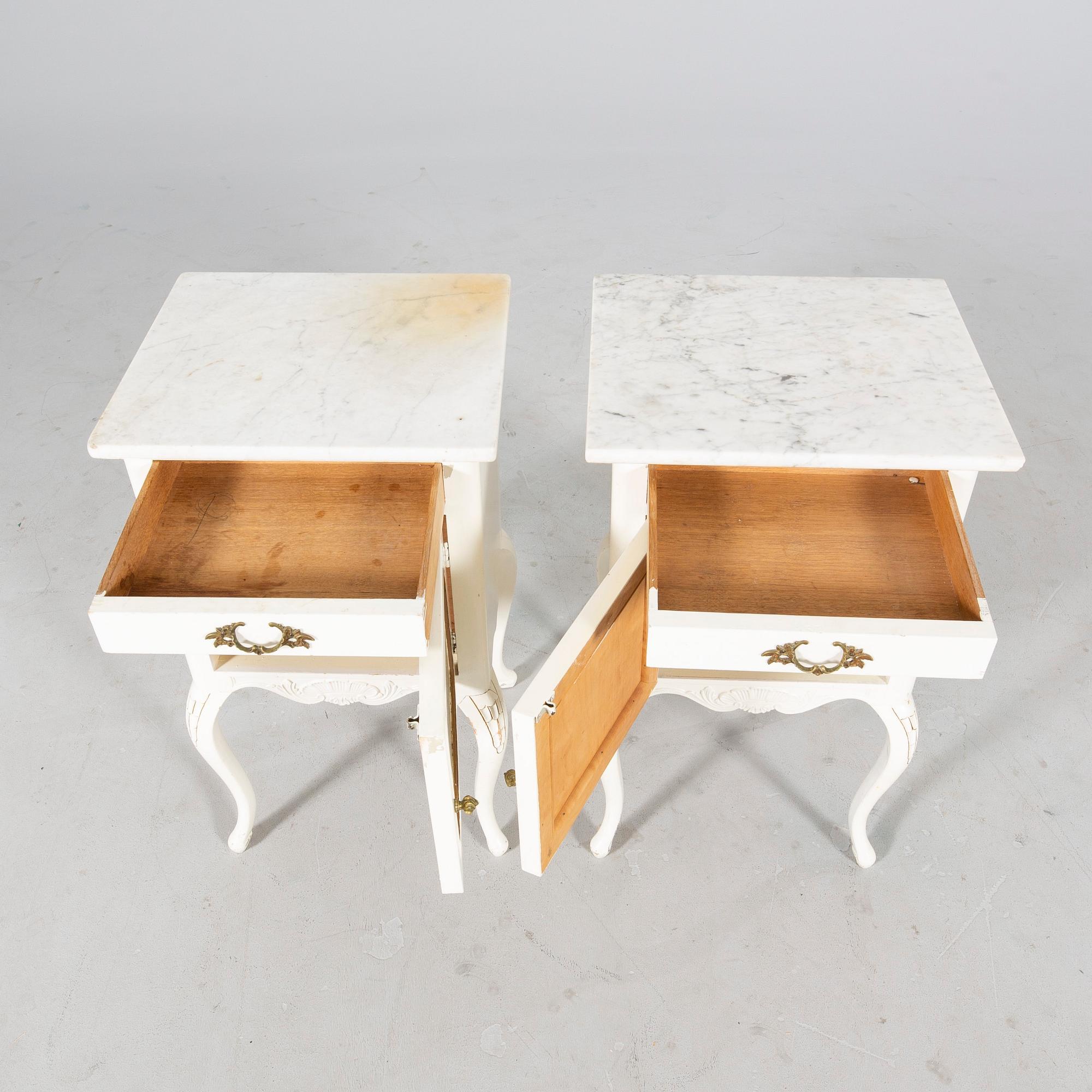 A pair of painted Rococo style bedside tables mid 1900s.
