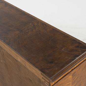 A stained birch veneered book cabinet, first half of the 20th Century.