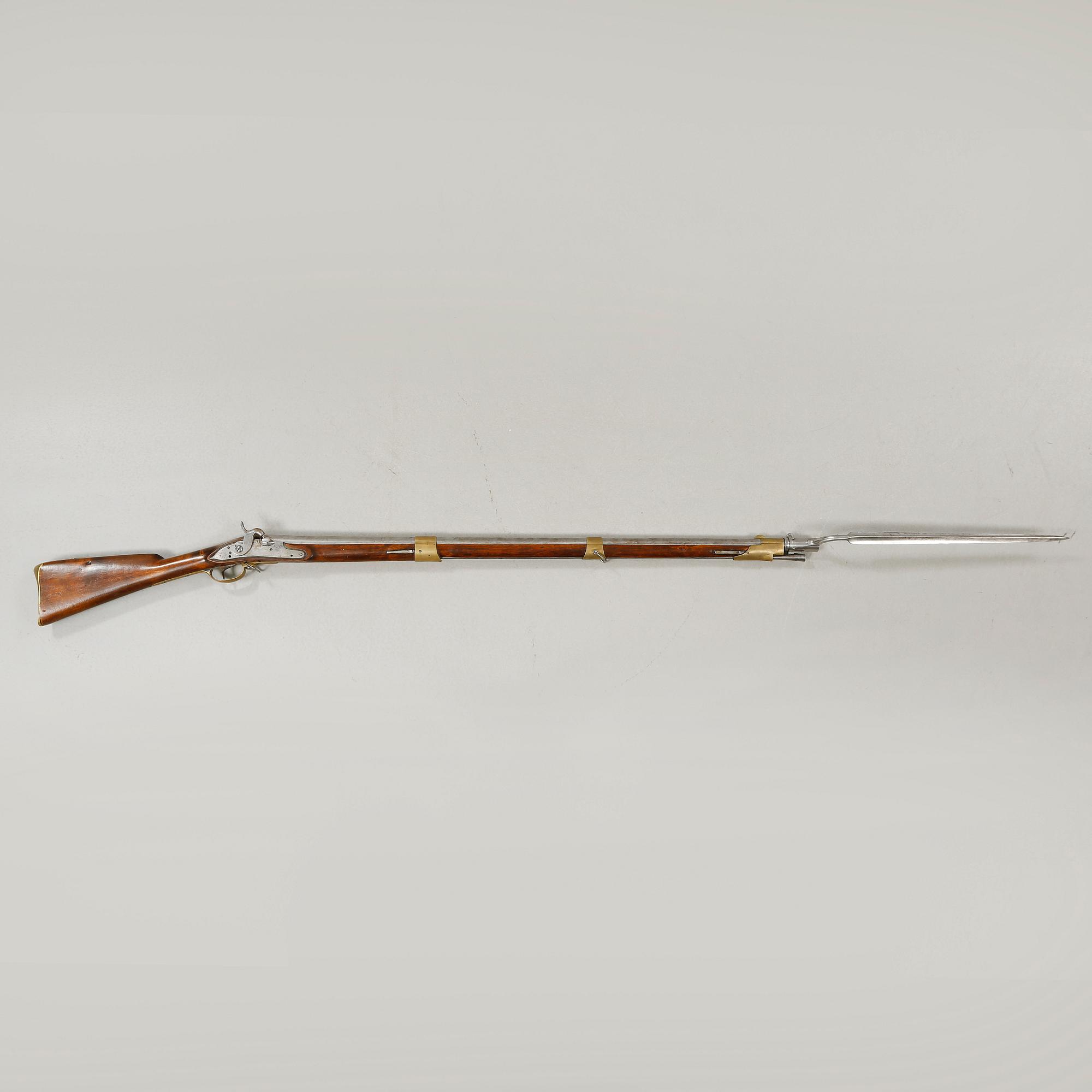 A percussion rifle with bayonet, probably swedish model 1815-45.