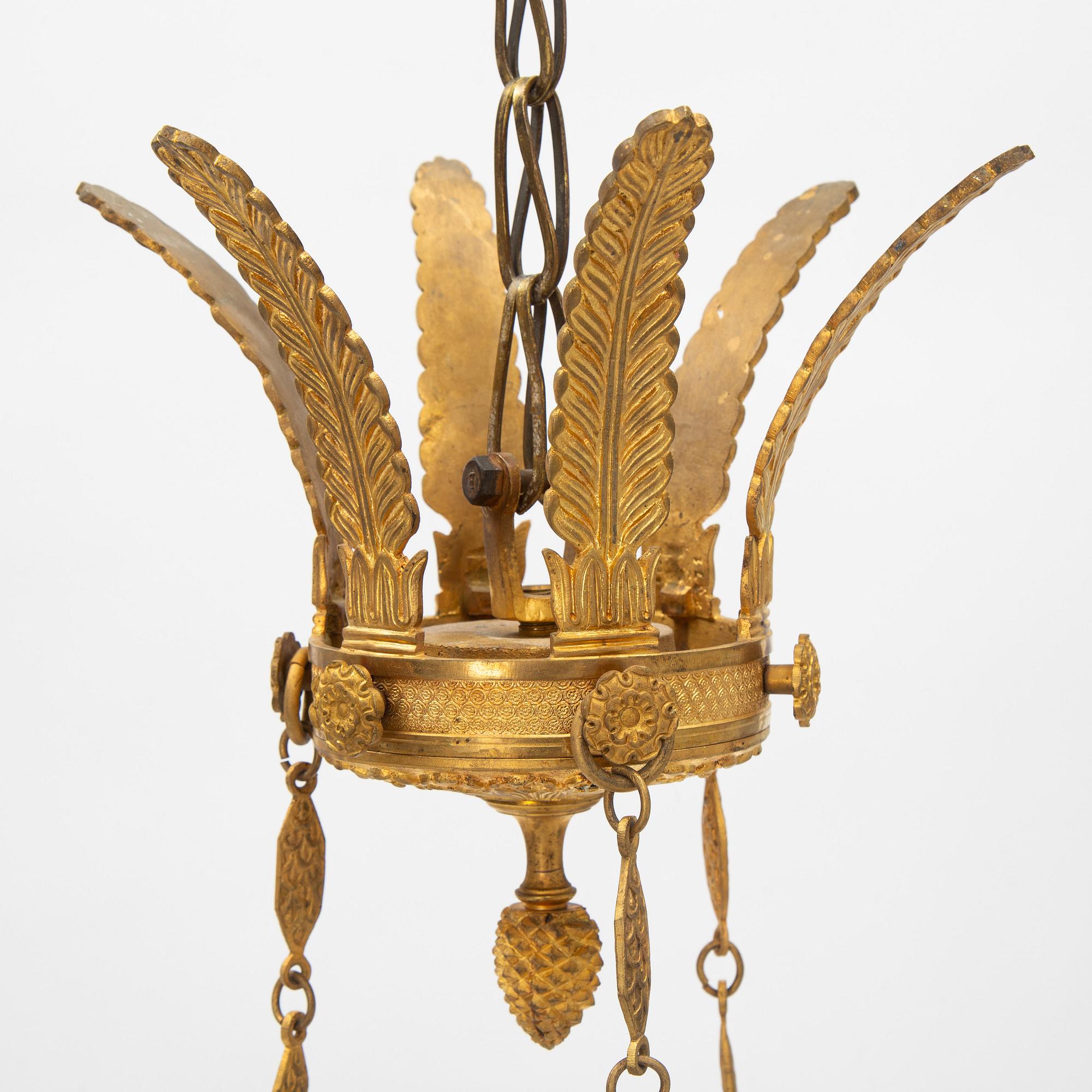 A presumably Italian Empire six-light ormolu chandelier, early 19th century.