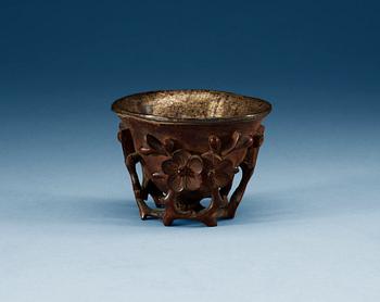 1710. A carved bambu libation cup, Qing dynasty.