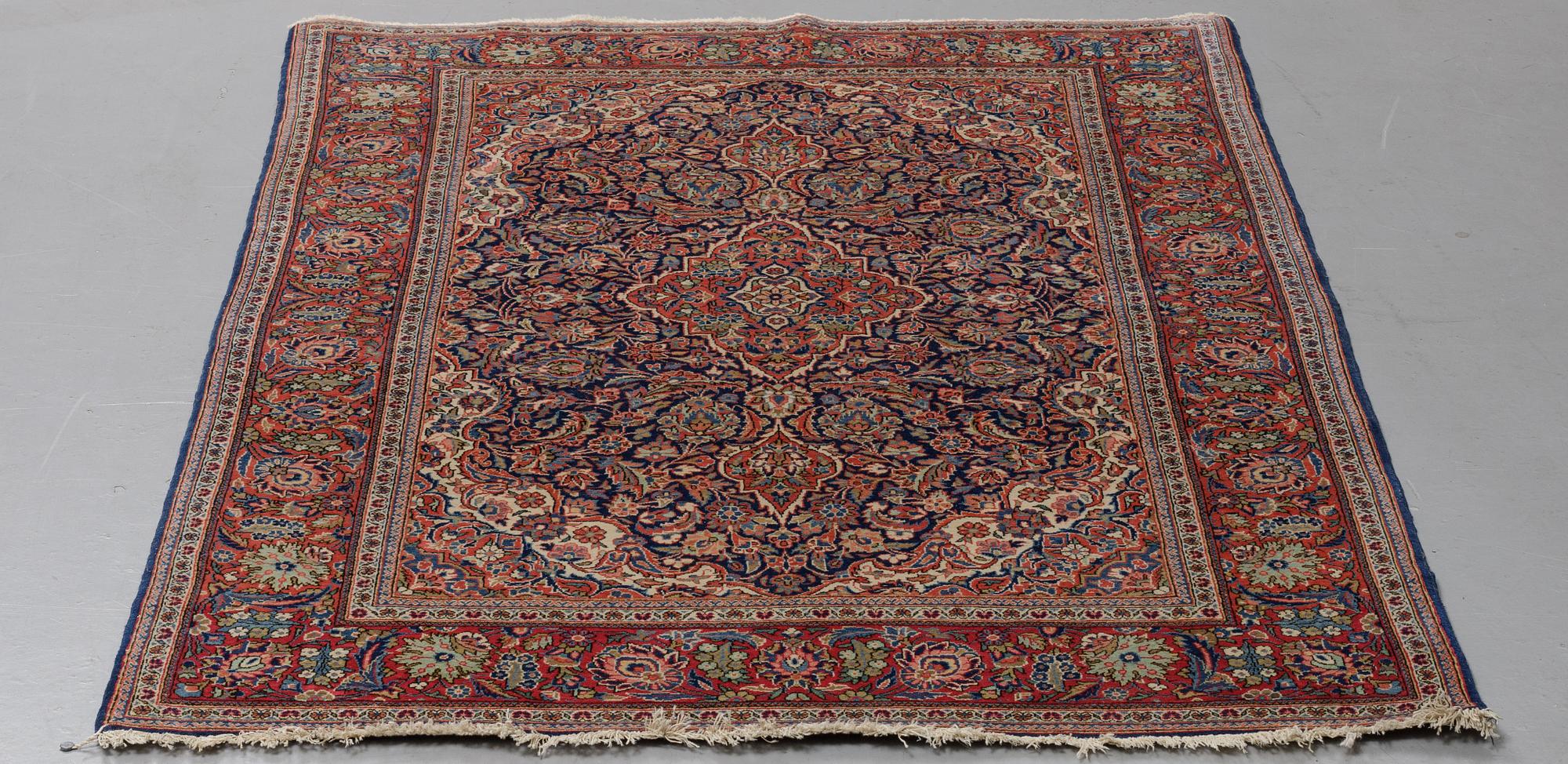 A rug, semi-antique Kashan, ca 204 x 138 cm.