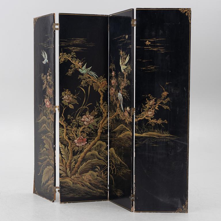 A wooden lacquer screen, 20th century.
