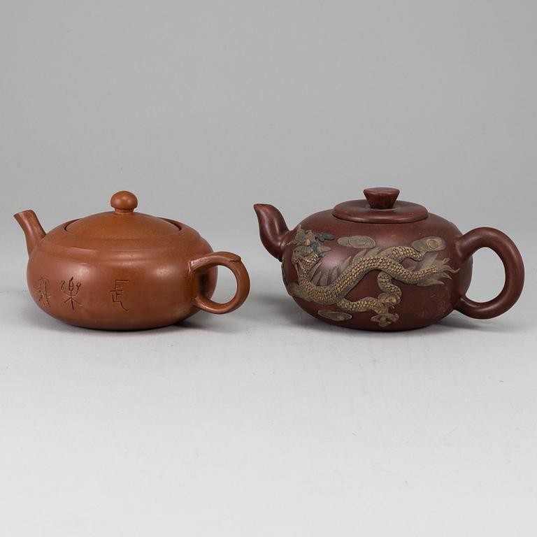 A group of two yixing teapots, 20th century.