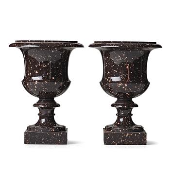 149. A pair if Swedish porphyry urns, early 19th century.