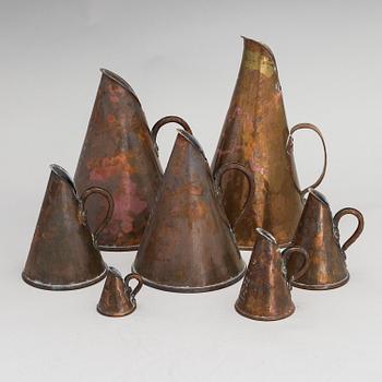 7 Swedish measuring cups from 20th century.