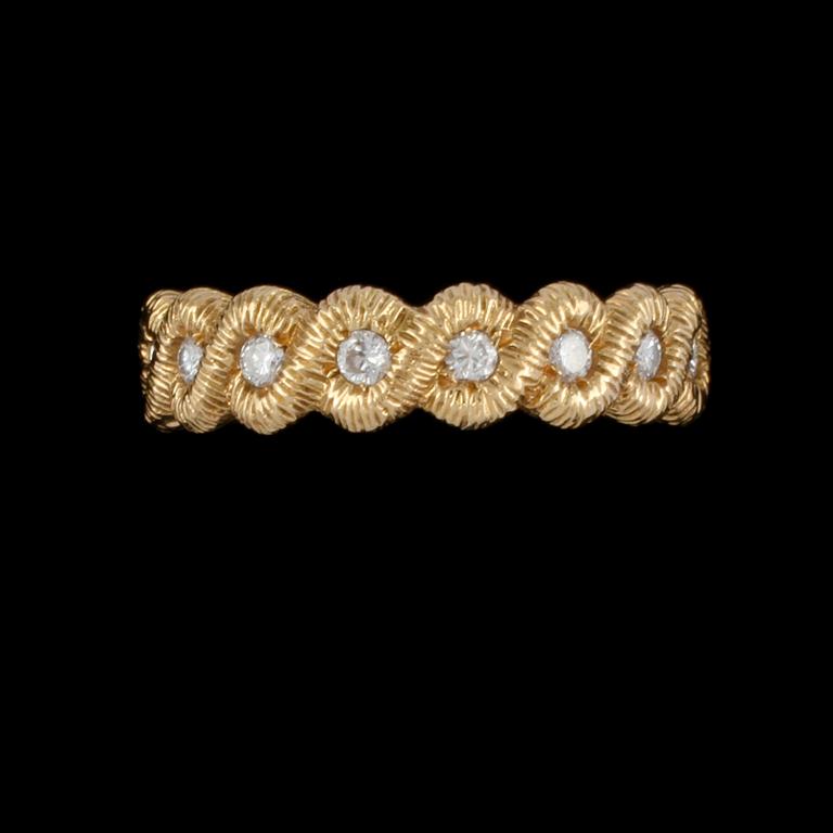 RING, 18k guld med briljantslipade diamanter, ca 0.60 ct, Scheweiz. Vikt 8 g.