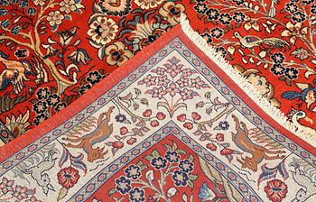 A Sarouk rug, approx. 212 x 140 cm.
