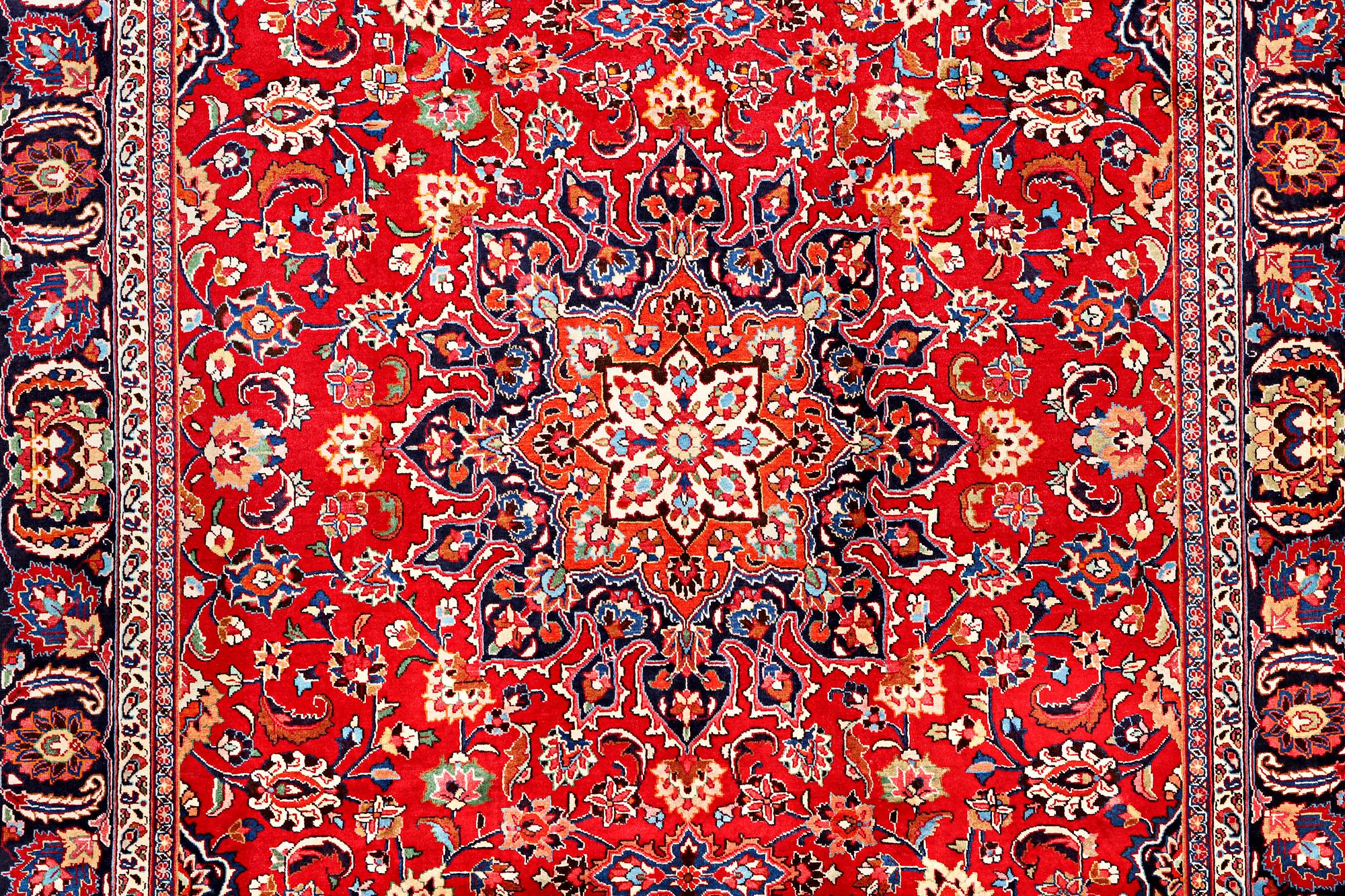 A Meshed carpet, c. 352 x 250 cm.