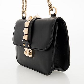 Valentino Garavani, a 'Glam Lock' bag.