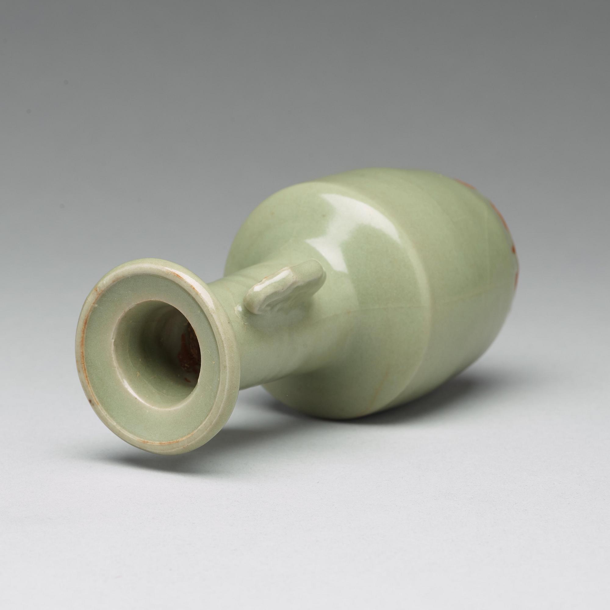 A mallet shaped celadon glazed vase, Yuan/Ming dynasty.
