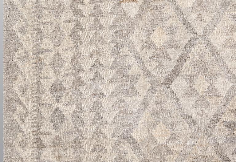 A kilim carpet, c 287 x 208 cm.