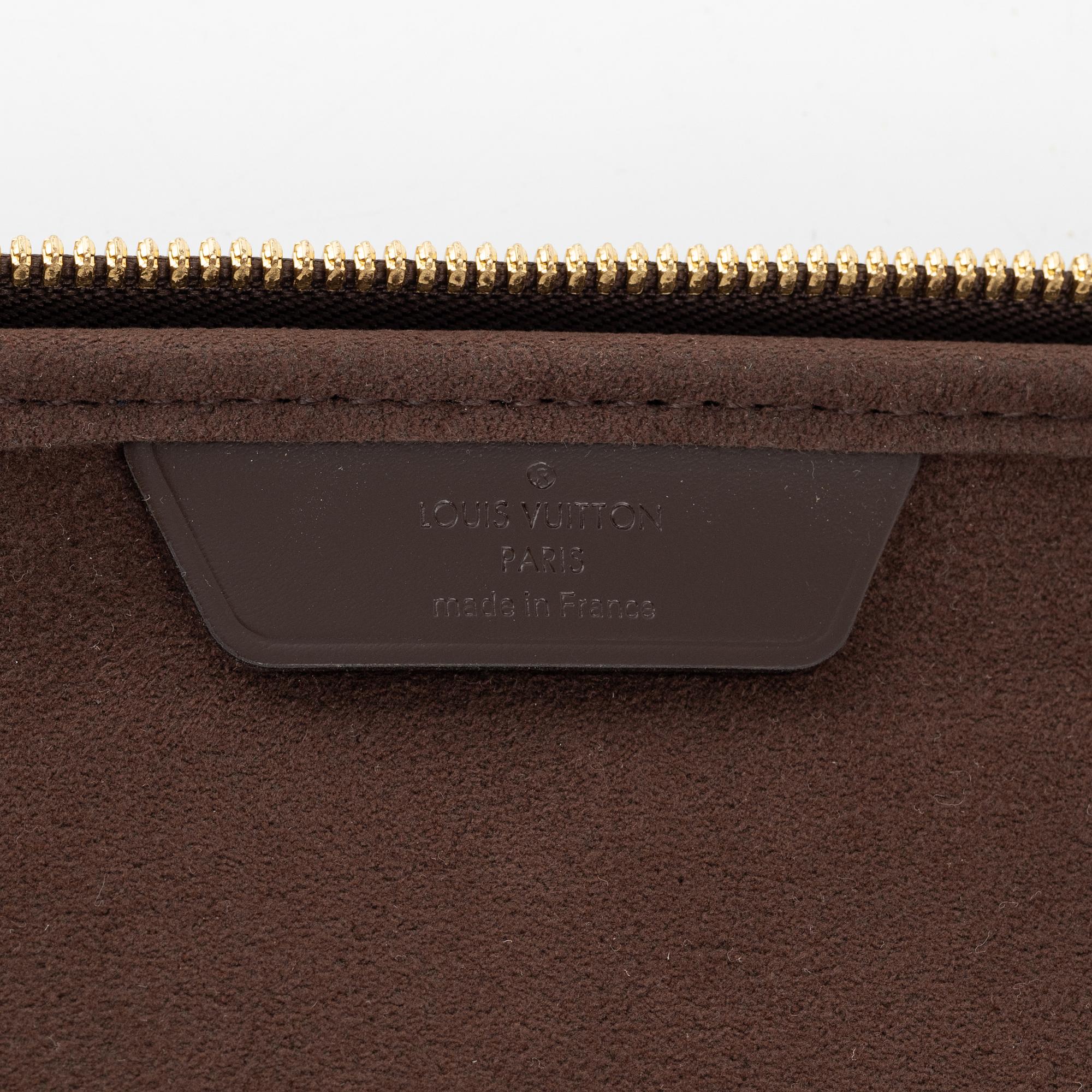 Louis Vuitton, A Damier Ebene laptop case, 2009.