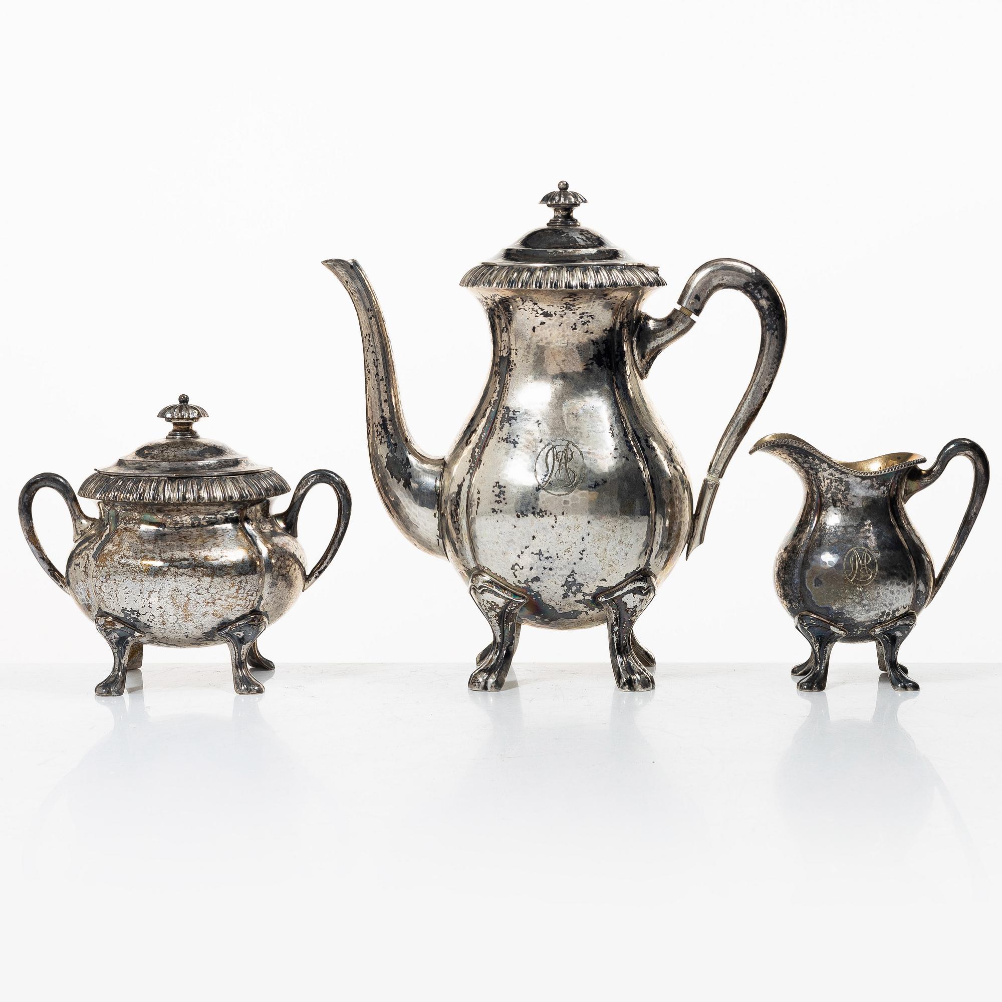 C.G. Hallberg, A three piece silver coffee service, Stockholm 1919.