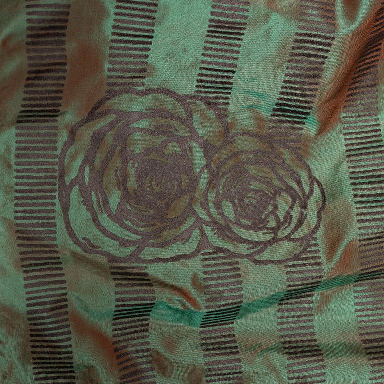 A set of four green silk curtains.