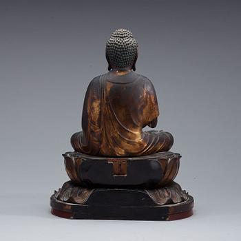 A Japanese wood and lacquer figure of buddha, Meiji (1868-1912).