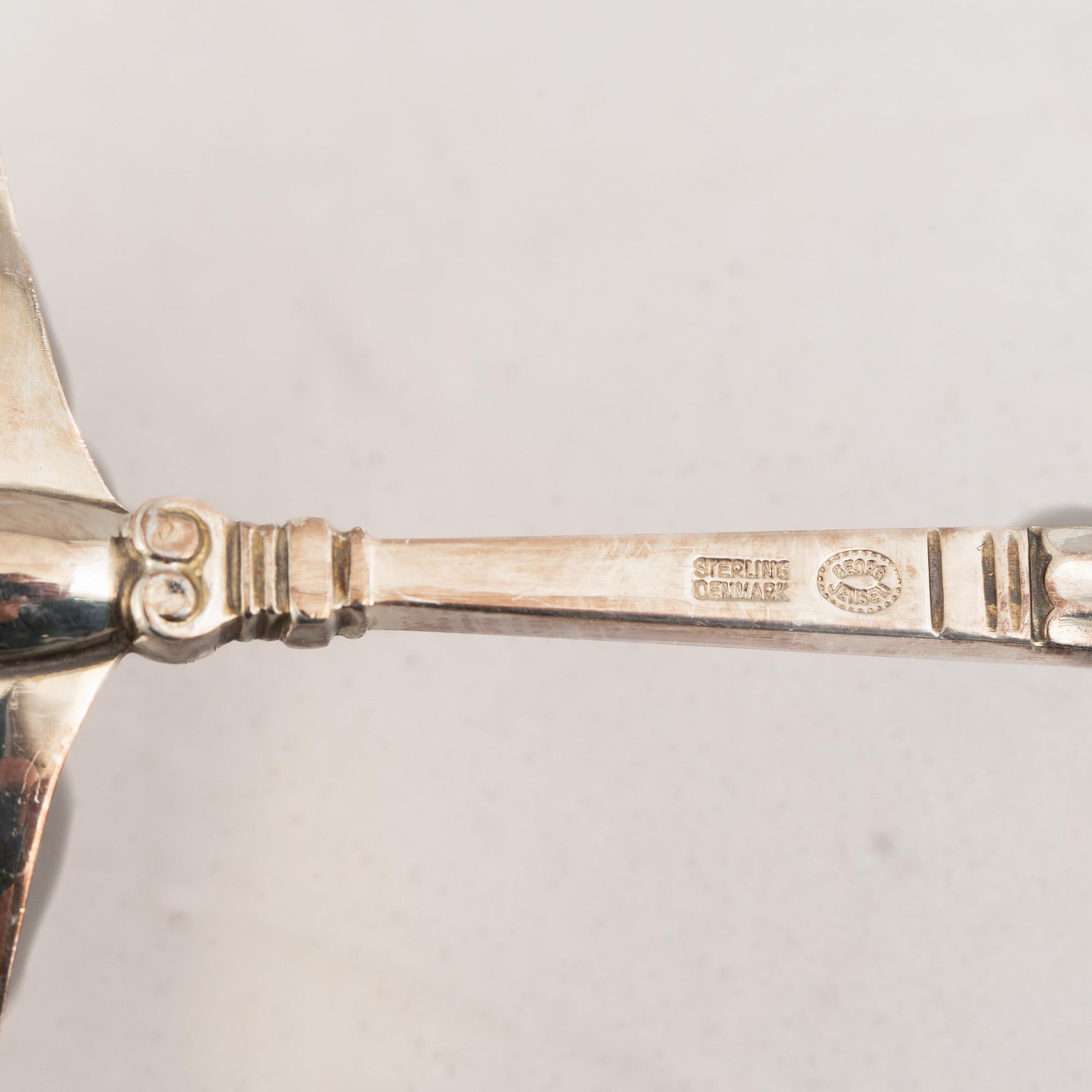 Johan Rohde, a 63-piece sterling silver flat wear set, "Konge"/"Acorn", Georg Jensen, Denmark.