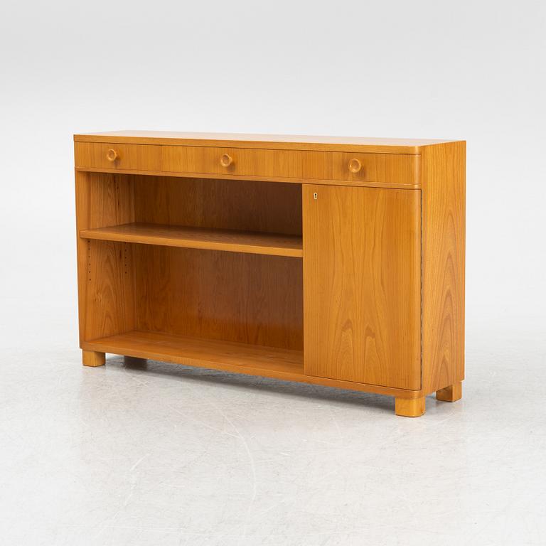 An elmwood-veneered bookcase, Nilsson & Johansson Möbelfabrik, Björnum, mid 20th century.