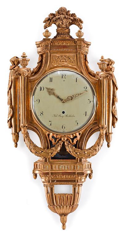 A Gustavian gilt wood wall clock by N. Berg.