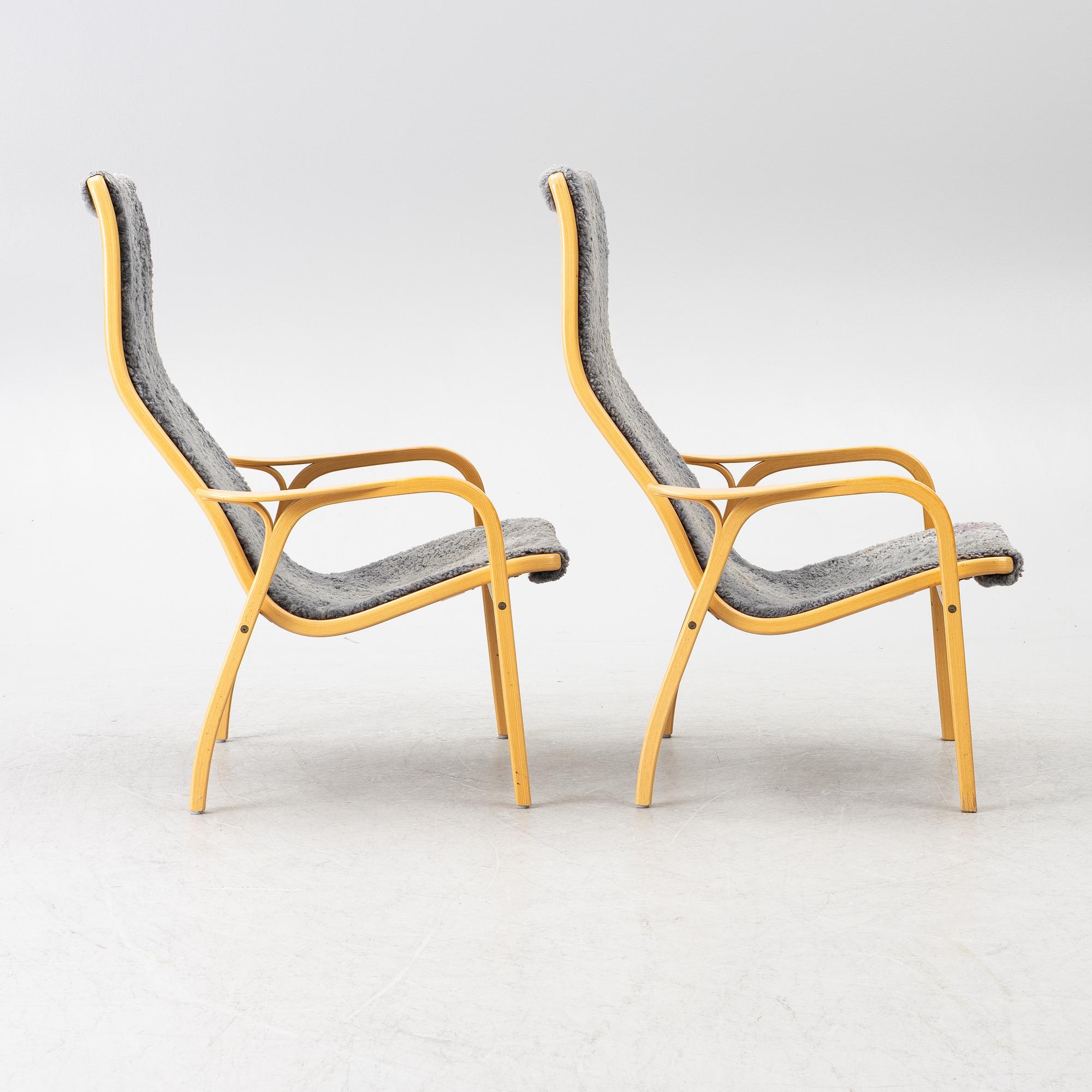 Yngve Ekström, a pair of 'Lamino' easy chairs, Swedese 2004.