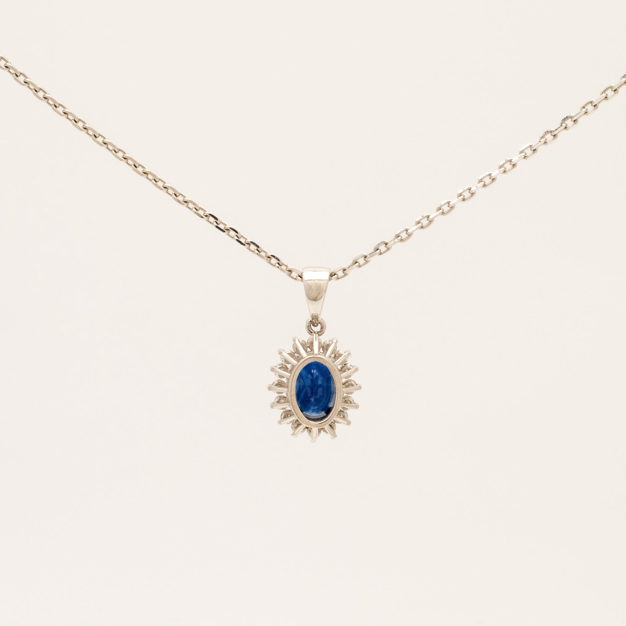 Necklace, 18K white gold with diamonds and sapphire.