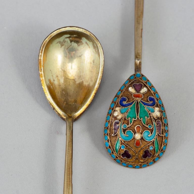 A Russian early 20th century set of ten silver-gilt and enamel tea-spoons, unidentified makers mark, Moscow 1899-1908.