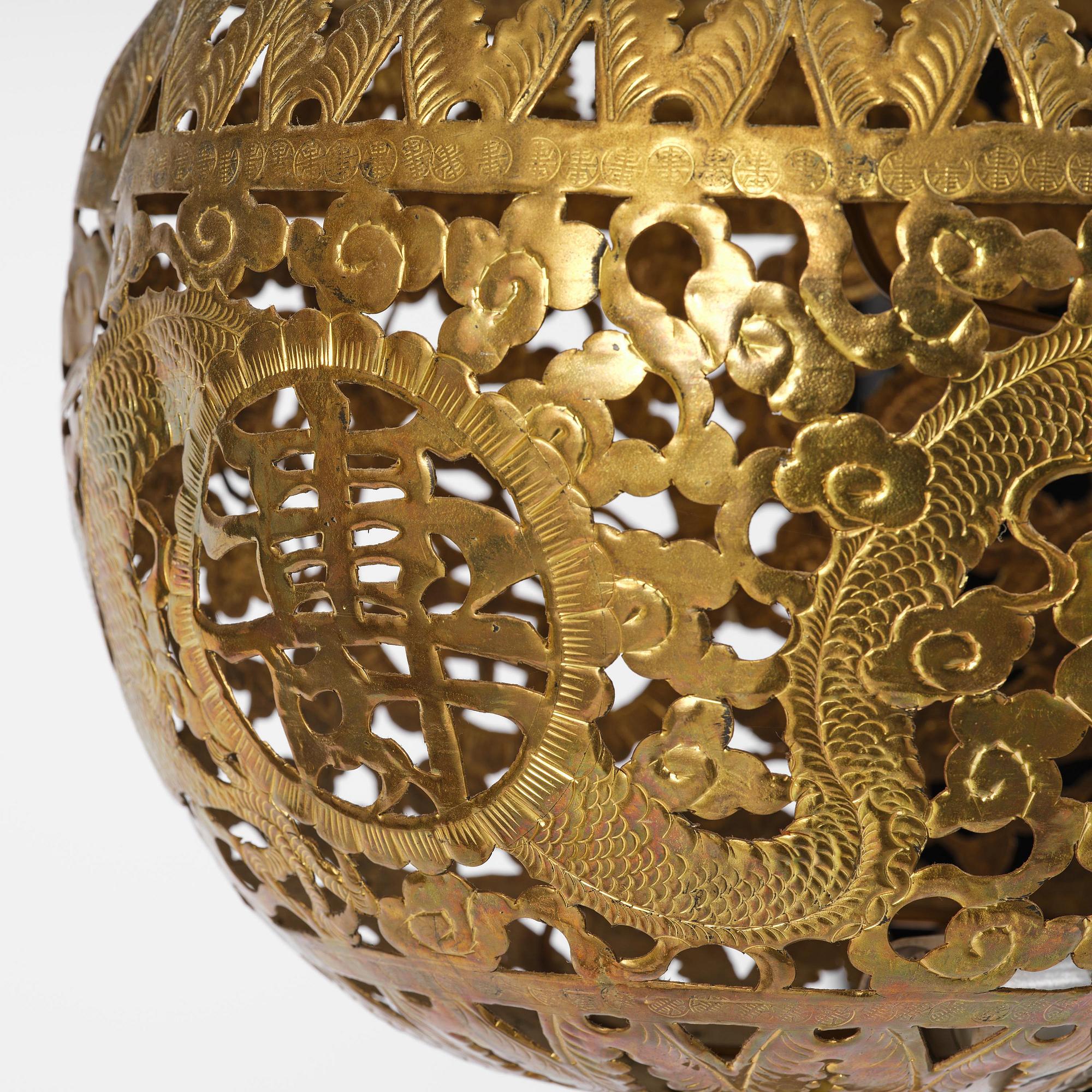 A Chinese gilt wood lantern with brass shade, Qing dynasty, 19th century.