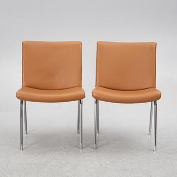 Hans J. Wegner, a pair pf "Kastrup Airport" lounge chairs, Denmark, late 20th century.
