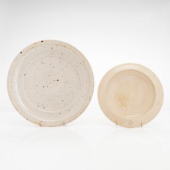Kyllikki Salmenhaara, two stoneware plates signed KS and a book signed by Kyllikki Salmenhaara.