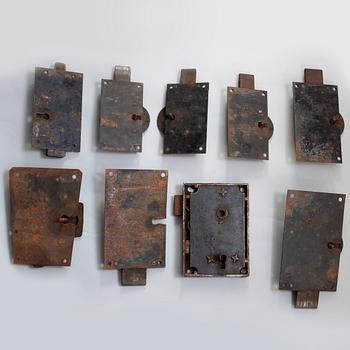 A set of nine cast iron locks, 19th century.