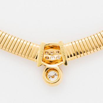 An 18K gold necklace set with a round brilliant-cut diamond.