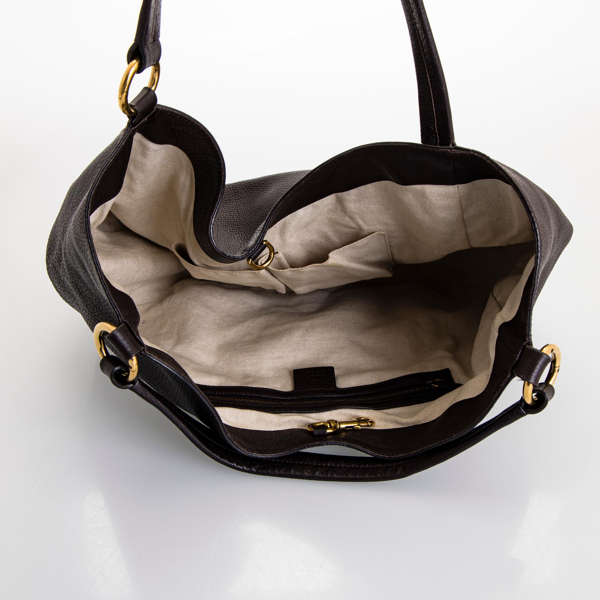 Gucci, an "Interlocking G" bag.